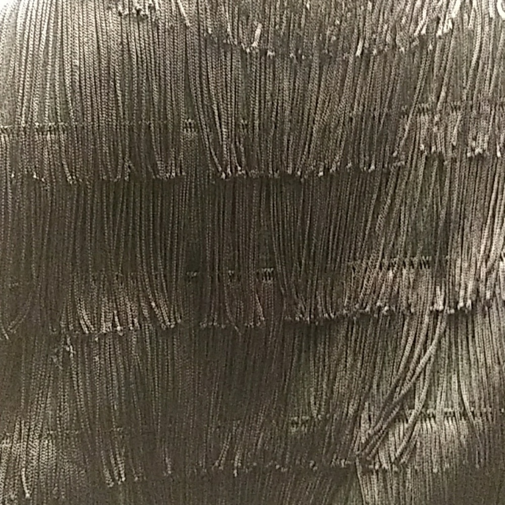 A black throw over - Picture 2 of 3